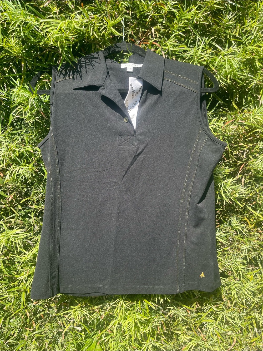 Women’s Black Sleeveless Golf Polo with Gold Stitching Detail